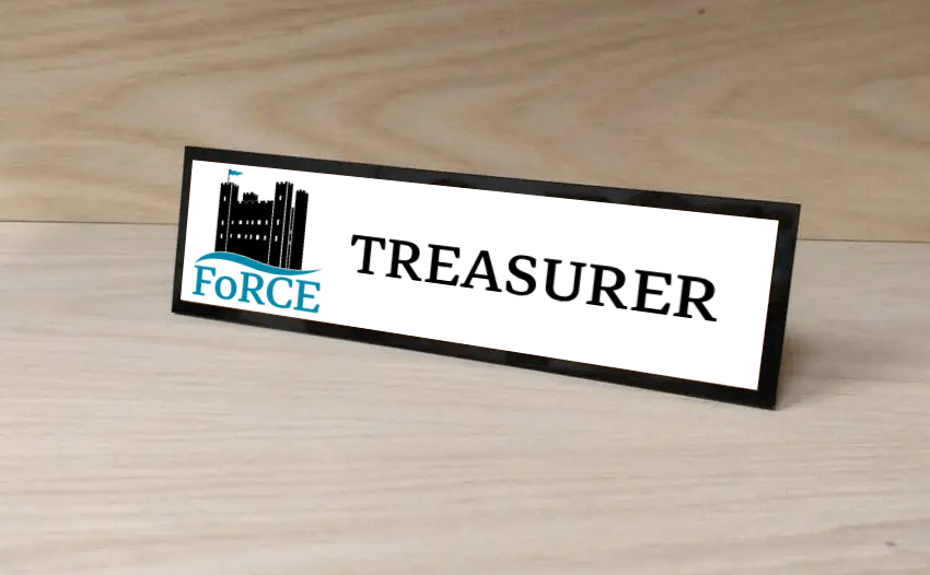 A desk plaque showing the Force castle Logo and the word &quot;Treasurer&quot;