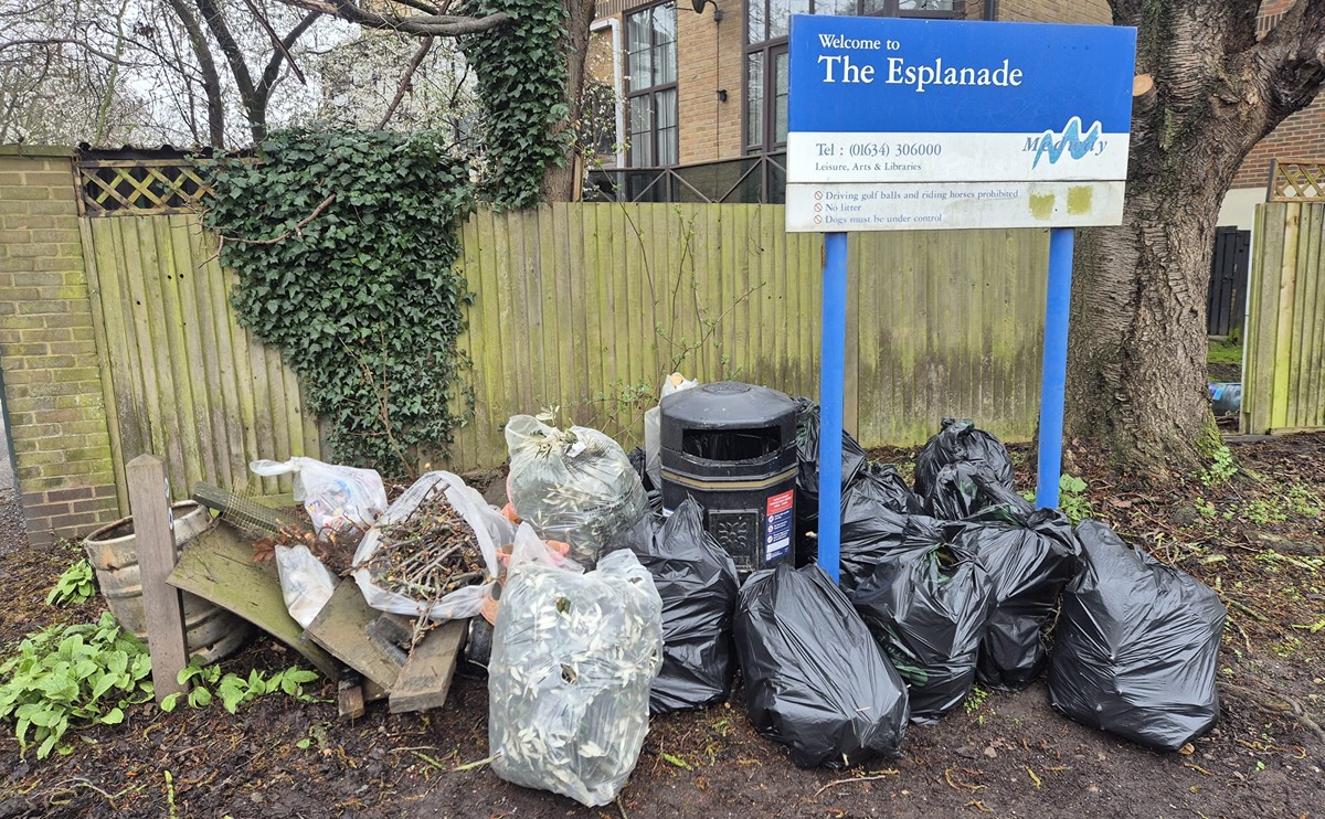 Ten bags of litter and green waste ready to be collected